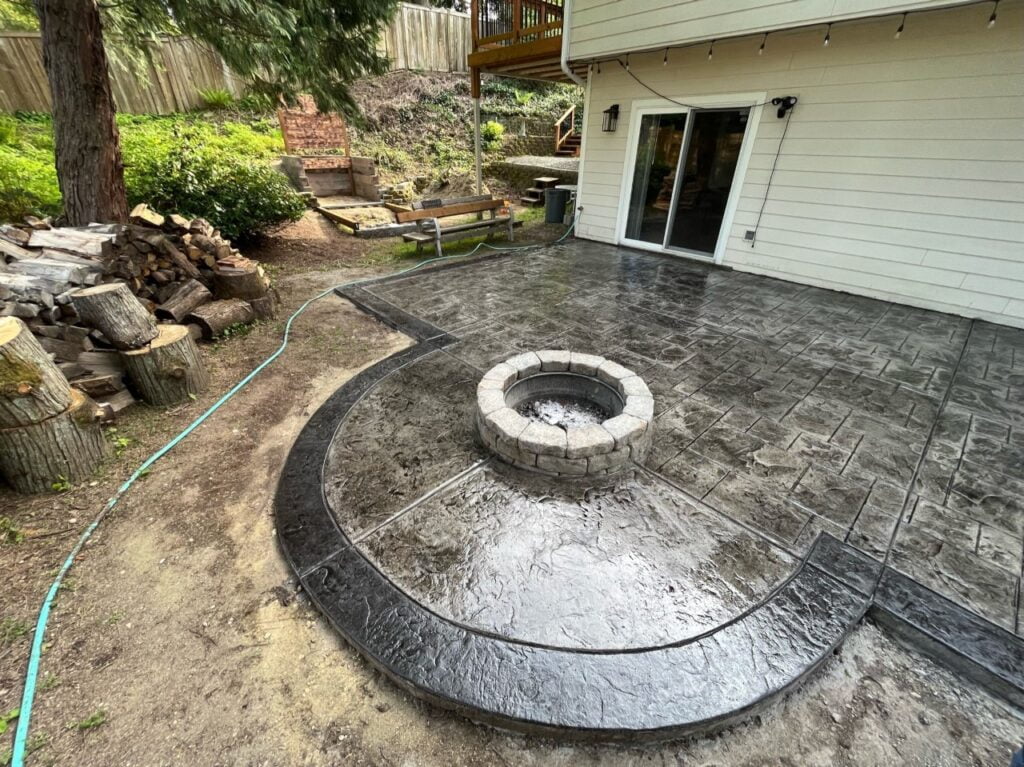 Stamped concrete patio with fire pit