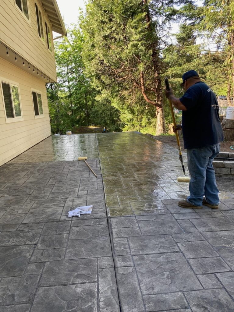 Laying sealent on a stamped concrete patio