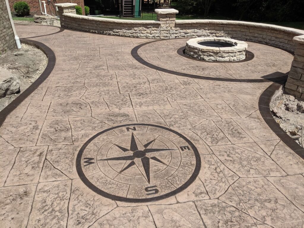 Specialized stamped concrete patio with firepit